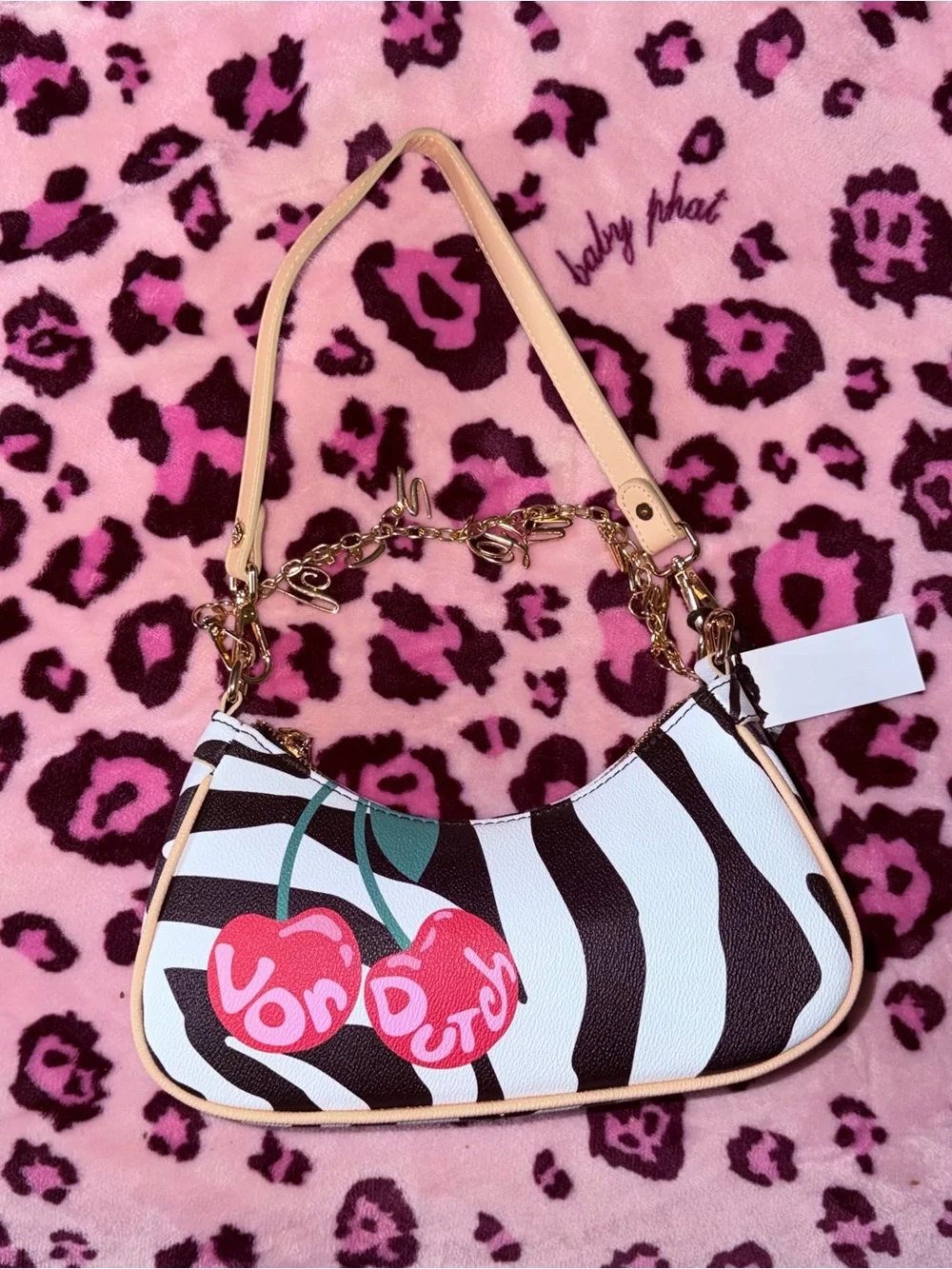 Von Dutch Rose Gold Charm Zebra Shoulder Bag in Black and White